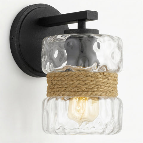 Kira Home Sage 9.5" Farmhouse Hammered Glass Wall Sconce with Natural Rope Accent, Industrial Cylinder Glass Shade Wall Light, Textured Black Finish