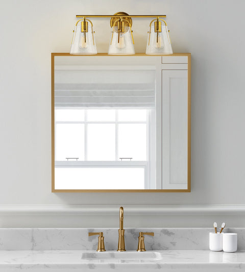 Kira Home Branson 22" 3-Light Modern Farmhouse Vanity/Bathroom Light + Seeded Glass Cone Shades, Gold Brass Finish